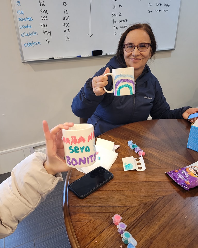 Mother and daughter painting mugs at Ellyn Crossing Teen Hangout with DuCAP on January 31st, 2024.