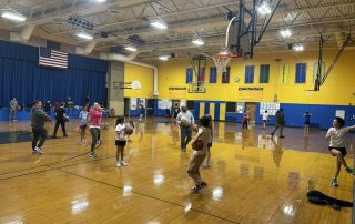 Teens & parents participating in Coach Nate's Open Gym Basketball program with DuCAP at Jefferson Middle School on Monday, February 5th, 2024.