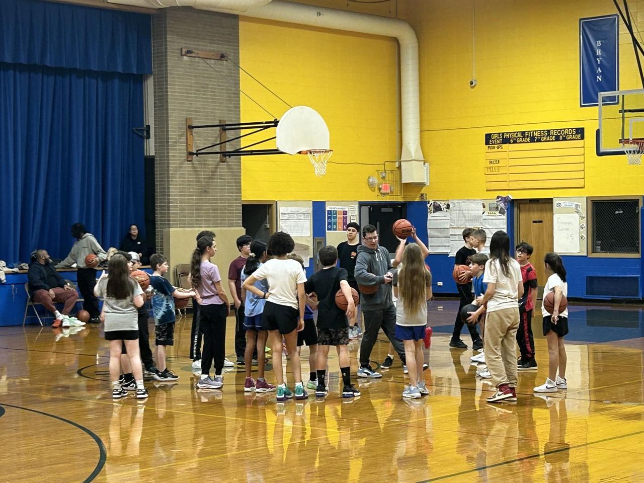 Teens participating in Coach Nate's Open Gym Basketball program with DuCAP at Jefferson Middle School on Monday, February 5th, 2024.
